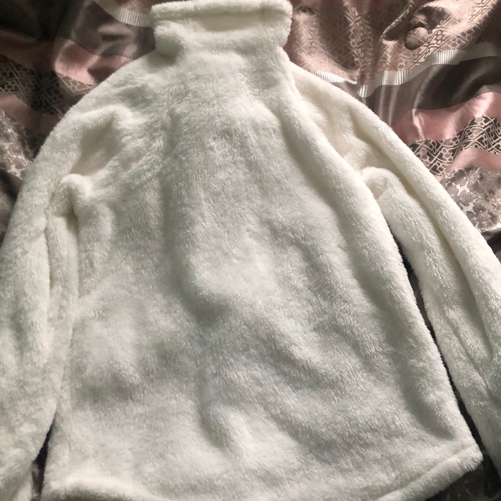 White turtleneck sweater